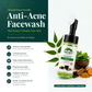 Himbuti Herbal Anti-Acne Facewash bottle with green leaves and spices on a white background